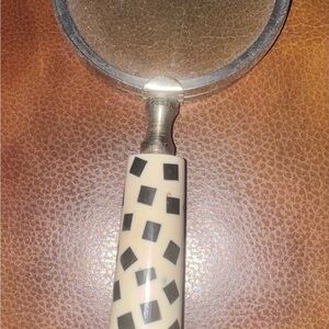 Stylish Black and Cream Magnifying Glass